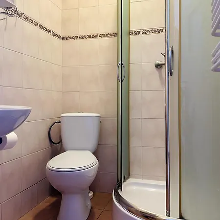 Quarto em Acomodações Particulares Goscinne Becia *