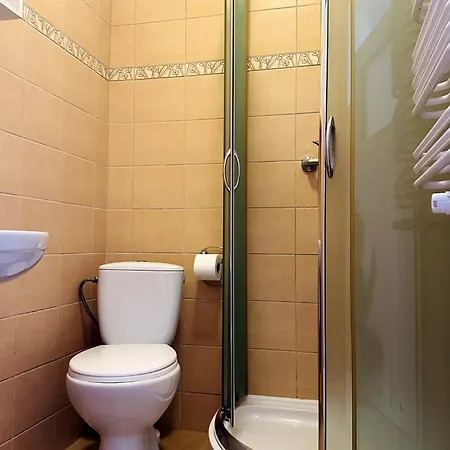 Quarto em Acomodações Particulares Goscinne Becia *