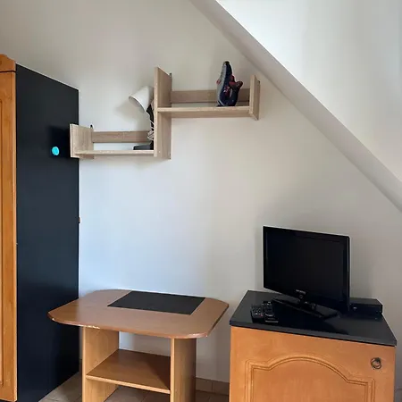 Quarto em Acomodações Particulares Goscinne Becia *